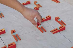 DTA Wedge Lippage Leveling System for Large Format Thin Tile Spacers