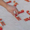 DTA Wedge Lippage Leveling System for Large Format Thin Tile (Spacers)